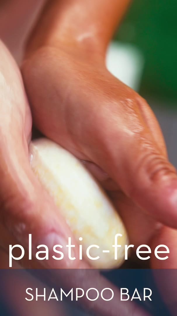 Hands holding a plastic-free shampoo bar, from Naples Soap's own film